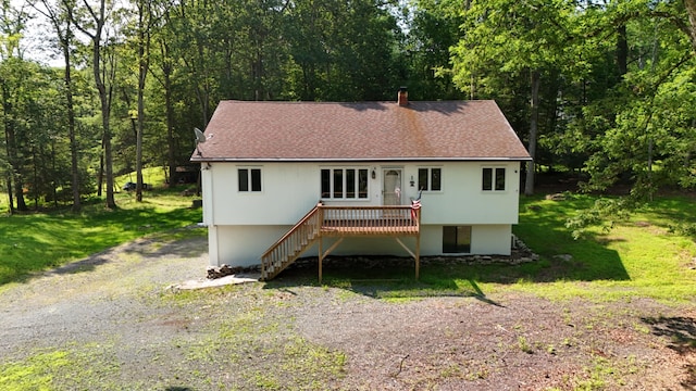 371 Ridge Cir, Cresco, PA 18326 - ranch-style house featuring a wooden deck, a shingled roof, stairway, and a forest view