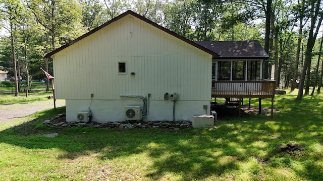 371 Ridge Cir, Cresco, PA 18326 - view of side of property with a sunroom, a lawn, and a shingled roof