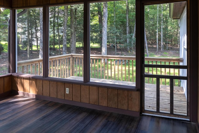 371 Ridge Cir, Cresco, PA 18326 - unfurnished sunroom featuring wood finished floors, healthy amount of natural light, a deck, and wooden walls
