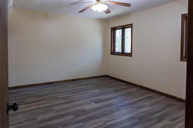 371 Ridge Cir, Cresco, PA 18326 - empty room featuring a ceiling fan, a textured ceiling, and dark wood-style floors