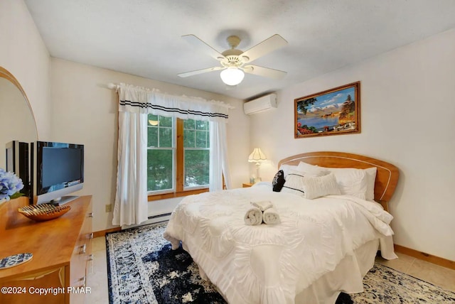 482 Spruce Dr, Tannersville, PA 18372 - tiled bedroom featuring ceiling fan, a wall mounted air conditioner, and baseboards