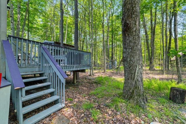 206 Maxatawny Dr, Pocono Lake, PA 18347 - view of yard featuring stairway, a deck, and a wooded view