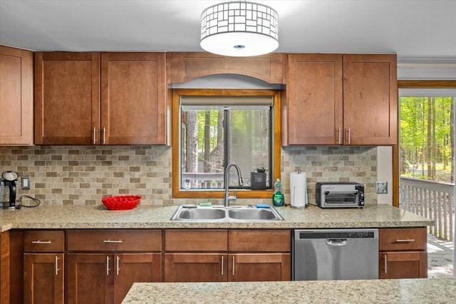 206 Maxatawny Dr, Pocono Lake, PA 18347 - kitchen featuring dishwasher, a sink, healthy amount of natural light, and tasteful backsplash