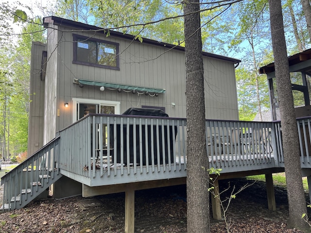 206 Maxatawny Dr, Pocono Lake, PA 18347 - rear view of house featuring a wooden deck and stairs