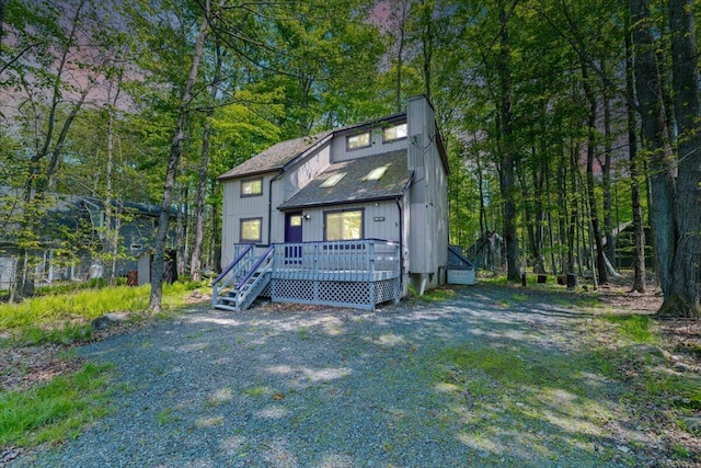 206 Maxatawny Dr, Pocono Lake, PA 18347 - view of front facade featuring a wooden deck and roof with shingles
