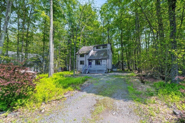 206 Maxatawny Dr, Pocono Lake, PA 18347 - view of front of house with driveway and a wooden deck