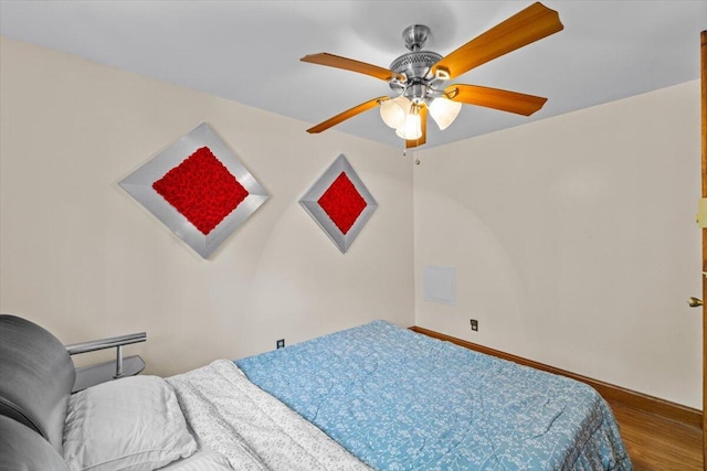 206 Maxatawny Dr, Pocono Lake, PA 18347 - bedroom with wood finished floors, baseboards, and a ceiling fan