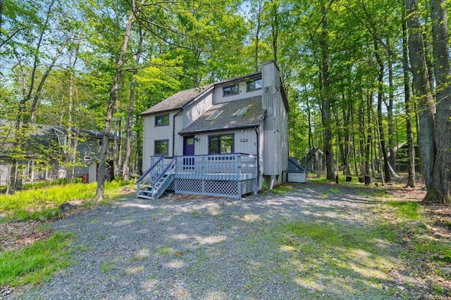 206 Maxatawny Dr, Pocono Lake, PA 18347 - view of front of property featuring a wooden deck and a shingled roof