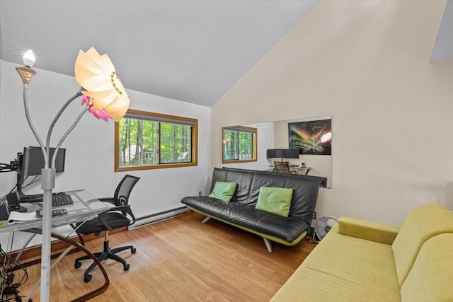 206 Maxatawny Dr, Pocono Lake, PA 18347 - home office featuring a baseboard heating unit, wood finished floors, and high vaulted ceiling