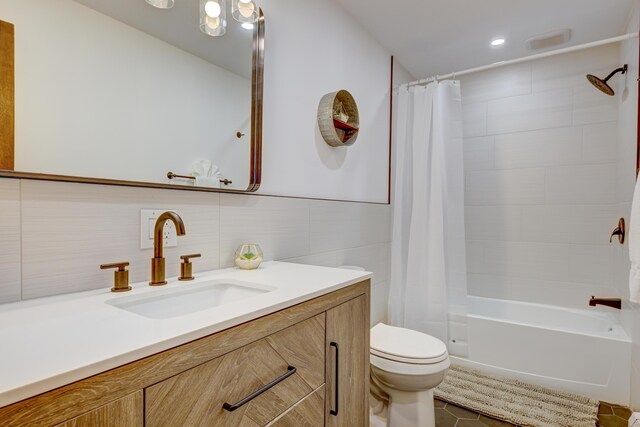 143 Cathleen Dr, East Stroudsburg, PA 18302 - bathroom featuring vanity, toilet, shower / bath combo with shower curtain, tile patterned floors, and recessed lighting