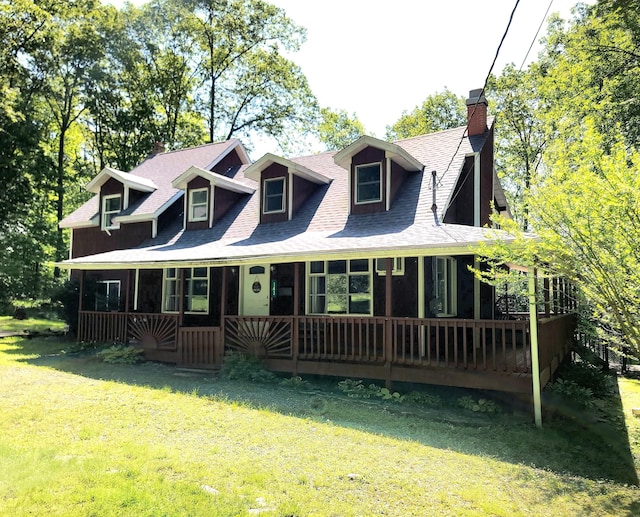 143 Cathleen Dr, East Stroudsburg, PA 18302 - view of front of property featuring a chimney, a front lawn, and roof with shingles