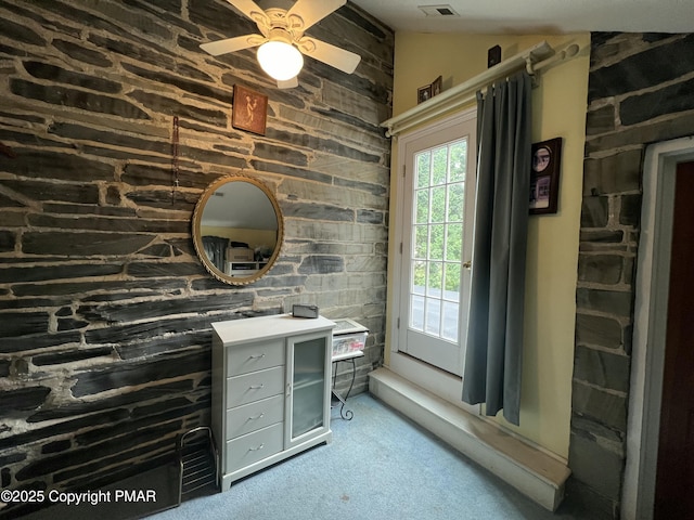 bathroom featuring a ceiling fan and vanity