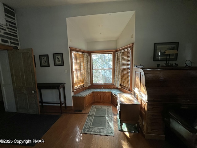 living area with light wood-type flooring and visible vents