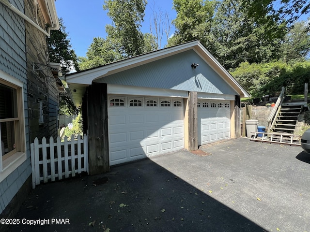 detached garage with fence