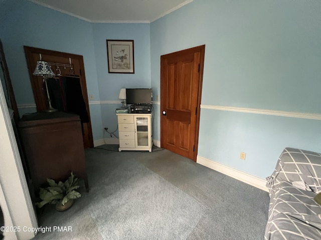 office with carpet flooring, crown molding, and baseboards