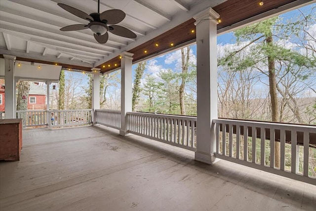 wooden terrace with ceiling fan