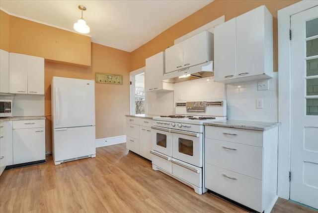 kitchen with tasteful backsplash, light wood-type flooring, white appliances, under cabinet range hood, and white cabinetry