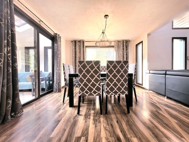 157 Seminole Trl, Tobyhanna, PA 18466 - dining room with wood finished floors and a textured ceiling