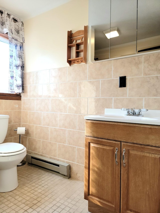 157 Seminole Trl, Tobyhanna, PA 18466 - bathroom with baseboard heating, tile walls, toilet, vanity, and tile patterned floors