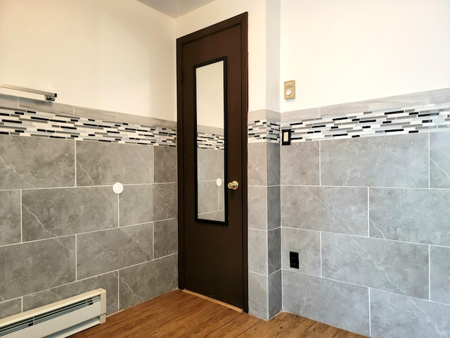 157 Seminole Trl, Tobyhanna, PA 18466 - bathroom with baseboard heating and wood finished floors
