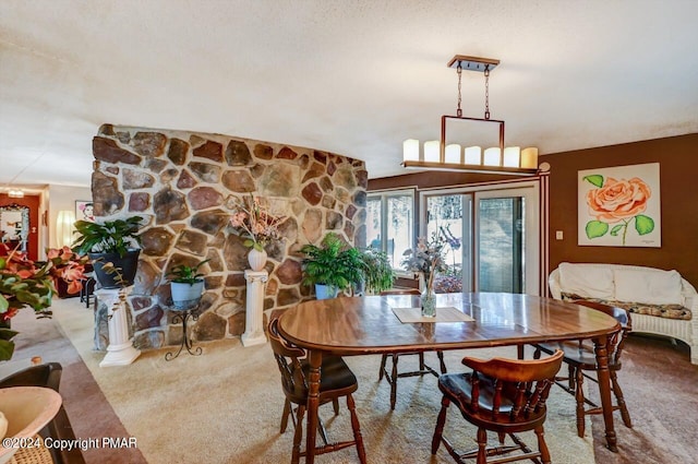 view of carpeted dining room