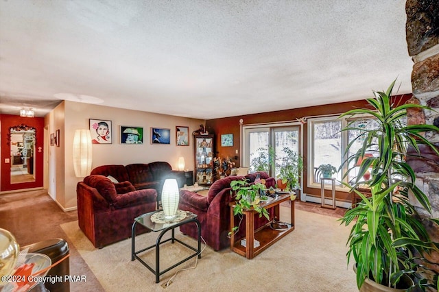 carpeted living room with baseboard heating and a textured ceiling