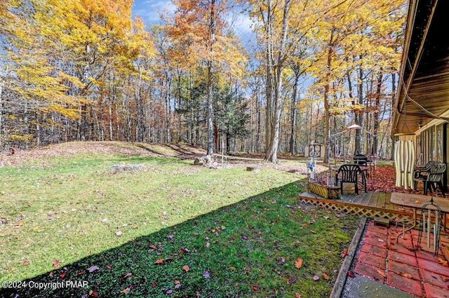 view of yard featuring a deck