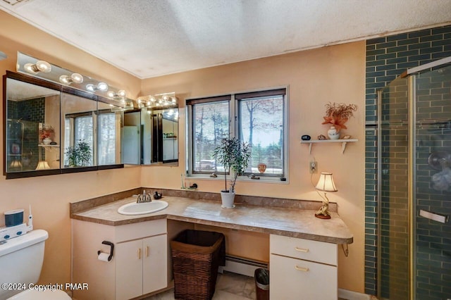 full bathroom with a textured ceiling, a baseboard radiator, toilet, vanity, and tiled shower