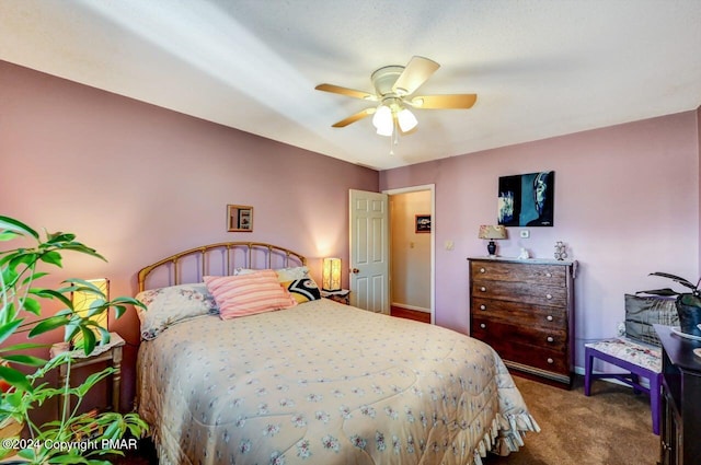 bedroom with carpet floors and a ceiling fan