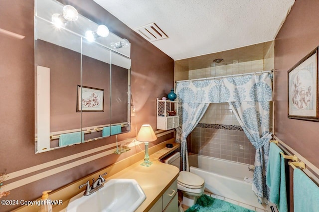 bathroom with visible vents, toilet, shower / tub combo, vanity, and a textured ceiling