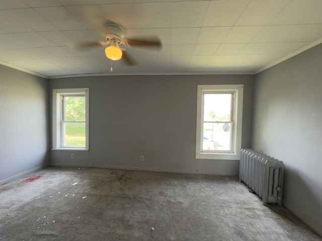 80 Parsonage St Rear, Rear, Pittston, PA 18640 - empty room featuring radiator, crown molding, ceiling fan, and baseboards