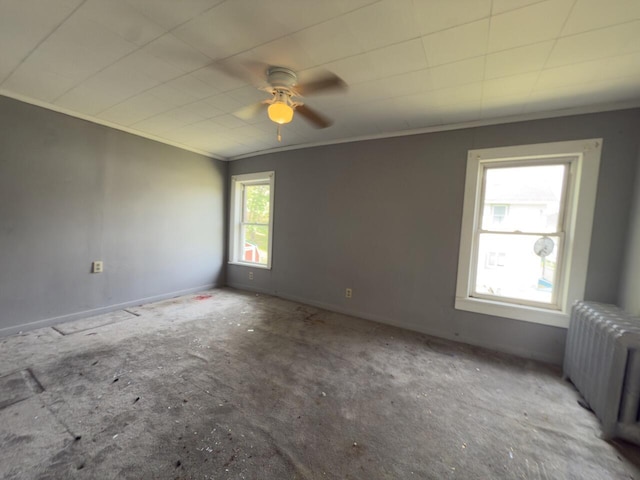 80 Parsonage St Rear, Rear, Pittston, PA 18640 - empty room featuring radiator, ceiling fan, ornamental molding, and baseboards