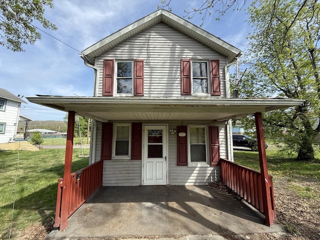 80 Parsonage St Rear, Rear, Pittston, PA 18640 - view of front of house featuring a porch and a front lawn