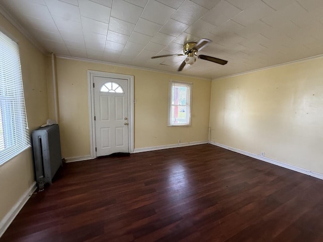 80 Parsonage St Rear, Rear, Pittston, PA 18640 - entryway with radiator heating unit, crown molding, dark wood-style floors, a ceiling fan, and baseboards