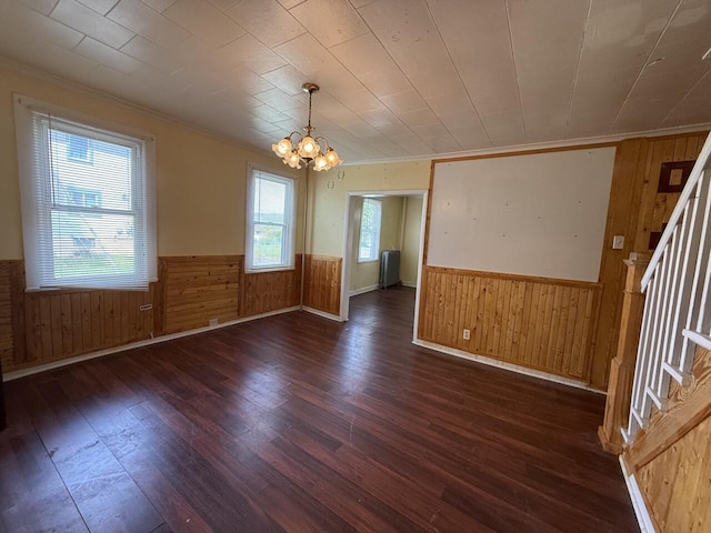 80 Parsonage St Rear, Rear, Pittston, PA 18640 - spare room with wainscoting, wood walls, ornamental molding, hardwood / wood-style flooring, and a chandelier