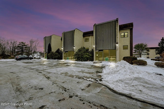 exterior space featuring stucco siding