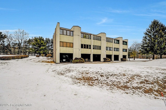 view of snow covered property