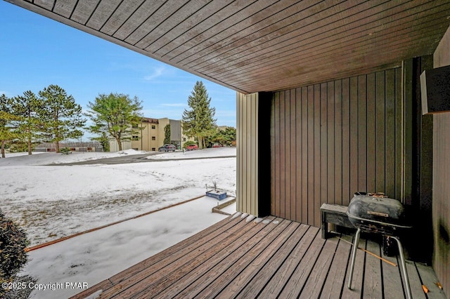 view of snow covered deck