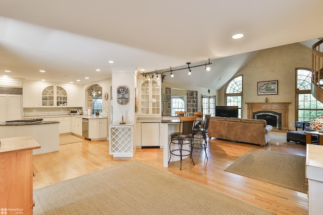 2711 Main St, Bethlehem, PA 18017 - kitchen featuring healthy amount of natural light, open floor plan, light wood-type flooring, recessed lighting, and high vaulted ceiling