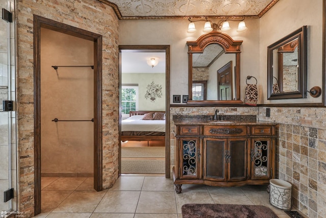 2711 Main St, Bethlehem, PA 18017 - full bathroom with vanity, tile patterned floors, and ornamental molding