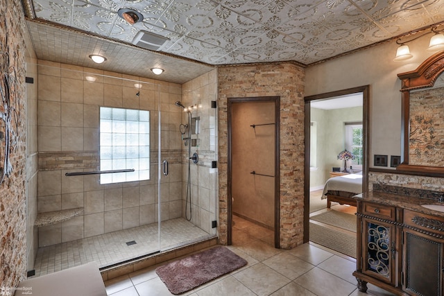 2711 Main St, Bethlehem, PA 18017 - full bathroom with ensuite bath, a shower stall, vanity, and tile patterned flooring