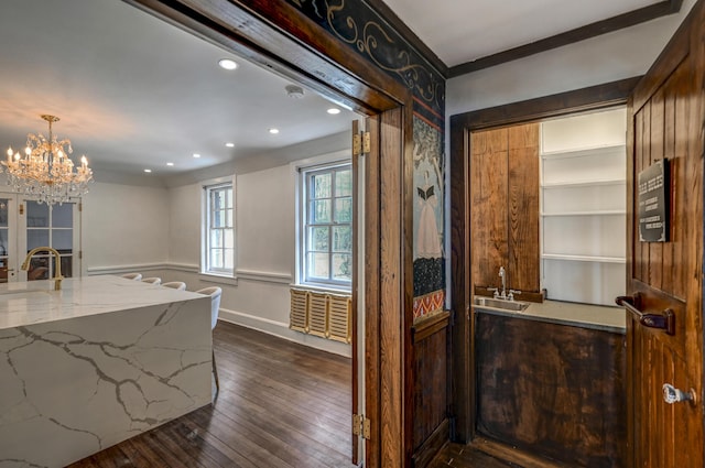 24 Summit Ave, Pocono Summit, PA 18346 - kitchen with recessed lighting, dark wood finished floors, a sink, stone counters, and a notable chandelier