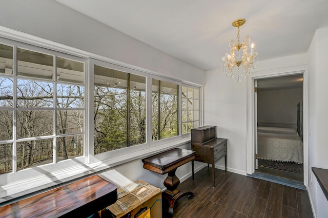 24 Summit Ave, Pocono Summit, PA 18346 - interior space featuring dark wood finished floors, baseboards, and a notable chandelier