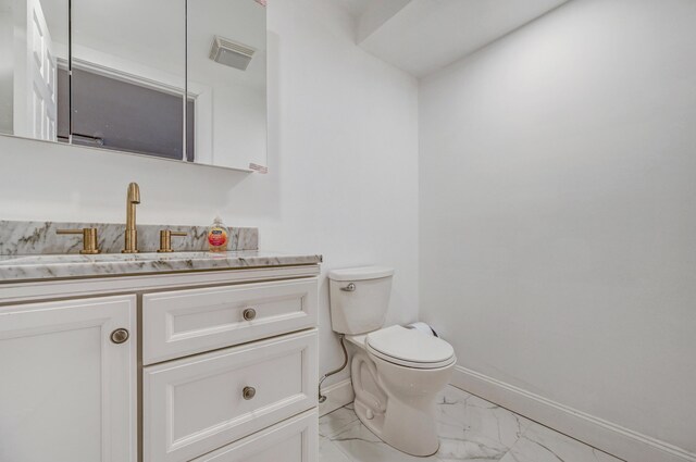24 Summit Ave, Pocono Summit, PA 18346 - bathroom with vanity, toilet, baseboards, marble finish floor, and visible vents