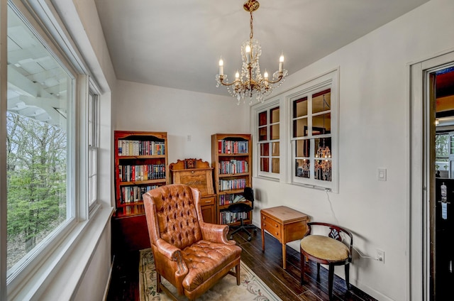 24 Summit Ave, Pocono Summit, PA 18346 - sitting room with baseboards, a notable chandelier, and wood finished floors