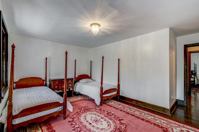 24 Summit Ave, Pocono Summit, PA 18346 - bedroom featuring baseboards and wood finished floors