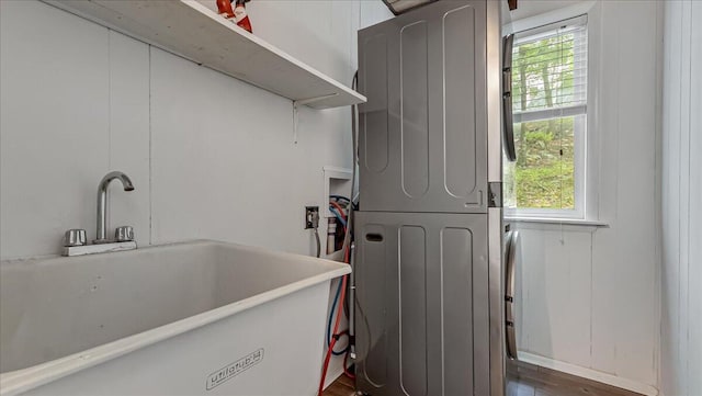 5015 Woodbridge Dr E, Bushkill, PA 18324 - laundry room with stacked washer / dryer and healthy amount of natural light