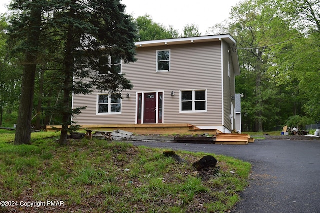 view of front of home featuring a wooden deck