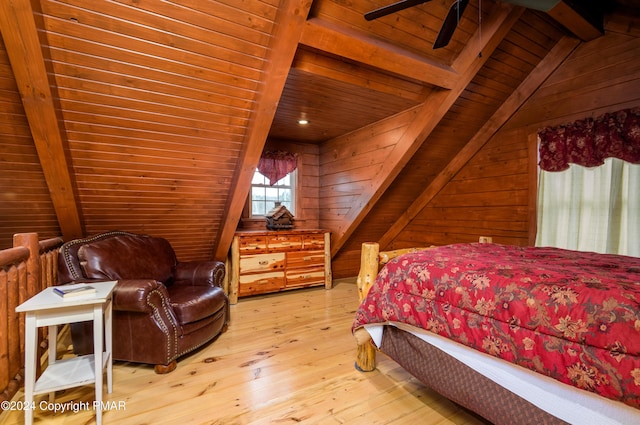 bedroom with lofted ceiling with beams, wood walls, wood ceiling, and hardwood / wood-style flooring