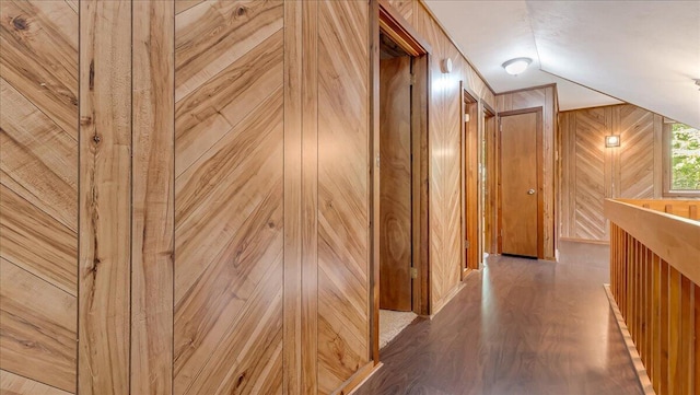 5913 NE Decker Rd NE, Bushkill, PA 18324 - hallway with wooden walls, vaulted ceiling, and wood finished floors